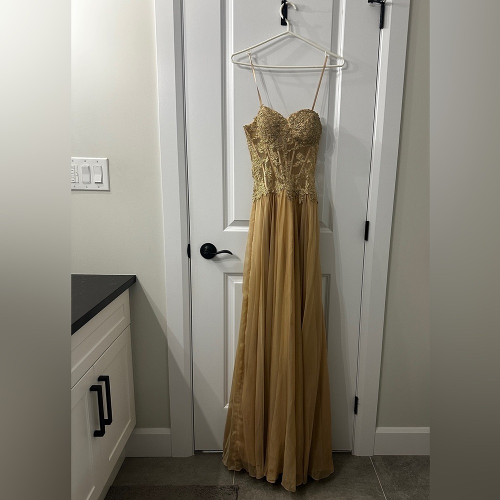 141. Elegant Gold Lace Gown